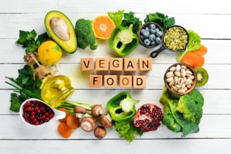 plant based diet vegetables around written "vegan food"